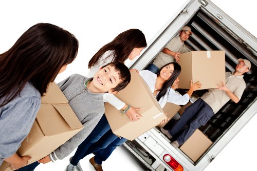 Furniture pick-up service working outside an Acton residential property