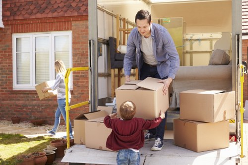 House removals team planning a move in Acton street setting