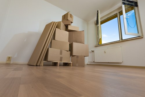 Loading furniture into a removal van for an Acton house move