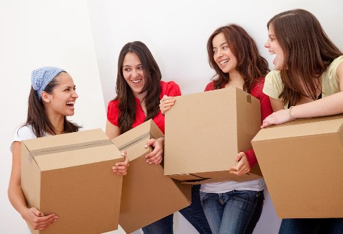 Careful unpacking and room organisation after a move in Acton