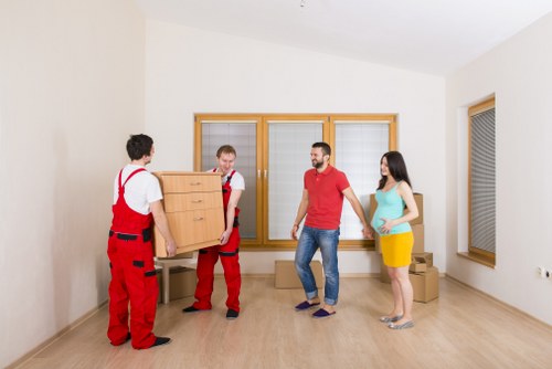 Packed furniture and moving boxes ready for local transport
