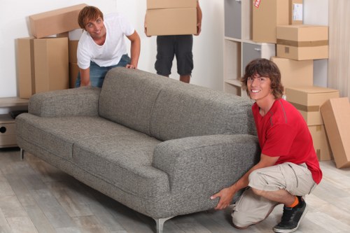 Careful loading of household furniture for an Acton relocation