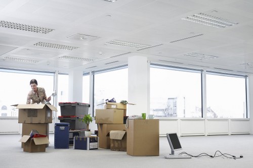 Careful furniture handling during a local house move in Acton