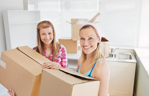 Local moving team helping a business with packing in Acton